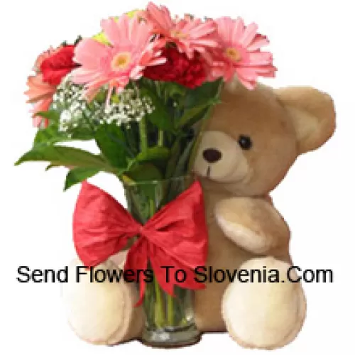 11 Red Carnations And Pink Gerberas In A Glass Vase Decorated With A Bow And Accompanied With A Cuddly Teddy Bear