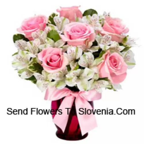 Pink Roses And White Alstroemeria Arrannged Beautifully In A Glass Vase