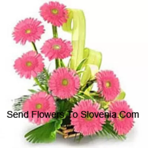 Basket Of 9 Pink Colored Gerberas With Fillers