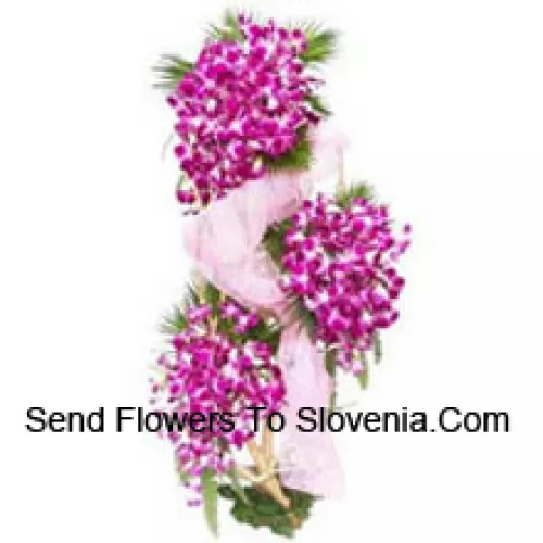 A 4 Feet Standing Arrangement Of Orchids