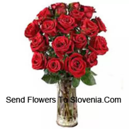 19 Red Roses With Some Ferns In A Vase