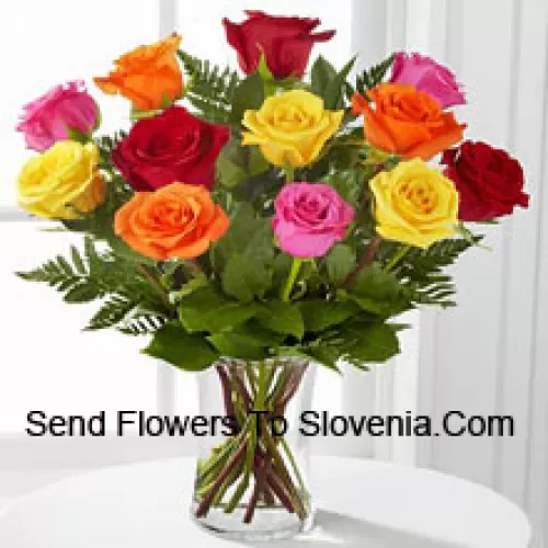 11 Mixed Colored Roses With Some Ferns in A Vase