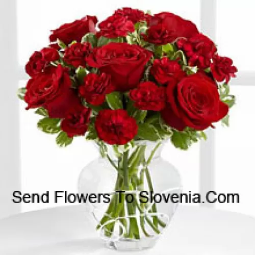 9 Red Roses And 8 Red Carnations In A Glass Vase