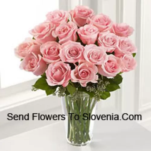 19 Pink Roses With Some Ferns In A Vase