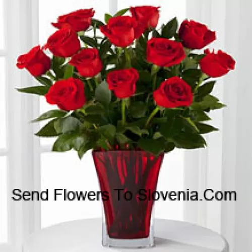 11 Red Roses With Some Ferns In A Vase