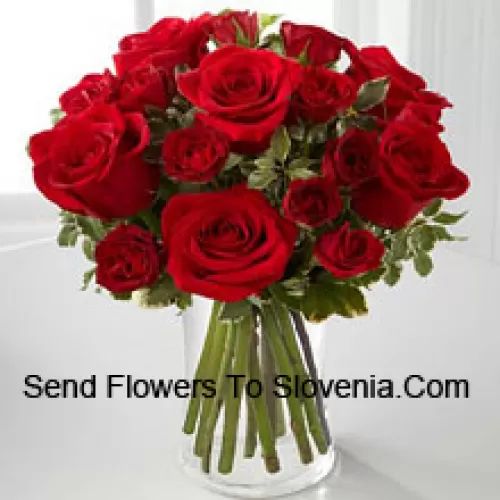 19 Red Roses With Some Ferns In A Vase