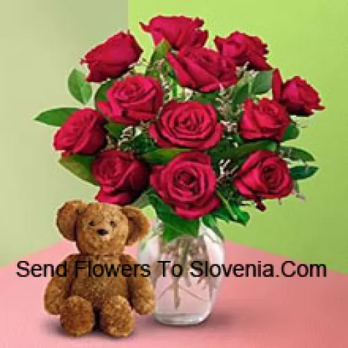 11 Red Roses With Some Ferns In A Vase And A Cute Brown 8 Inches Teddy Bear