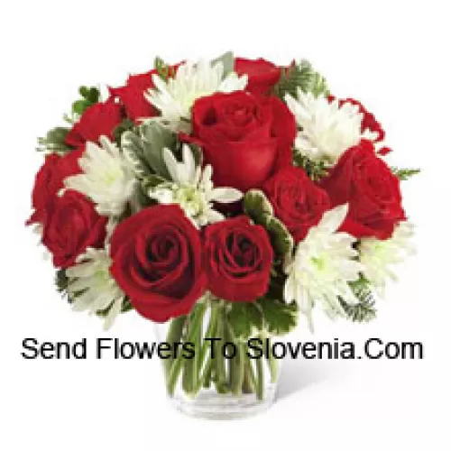 This Bouquet?is a charming display of holiday beauty and winter warmth. Rich red roses and spray roses pop against white chrysanthemums, assorted Christmas greens and eucalyptus, arranged in a round clear glass vase to create a gift that will spread the goodwill of the season to your special recipient. (Please Note That We Reserve The Right To Substitute Any Product With A Suitable Product Of Equal Value In Case Of Non-Availability Of A Certain Product)