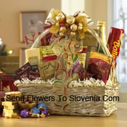 This gift basket shines for the holidays with a great selection of gourmet food for all. A shimmering basket holds Dutch Gouda Cheese Biscuits, Crantastic Snack Mix, Chocolate Cocoa, Scottish Shortbread Fingers, Roasted Peanuts, assorted Godiva Dark Chocolates, Smoky Cheddar, Fancy Water Crackers, Swedish Ballerina Cookies, Holiday Mints, Bellagio Caramella Coffee, Christmas Tea, and non-alcoholic Sparkling Apple Cider. It makes a nicely balanced selection of sweet and savory foods that are sure to please. (Please Note That We Reserve The Right To Substitute Any Product With A Suitable Product Of Equal Value In Case Of Non-Availability Of A Certain Product)